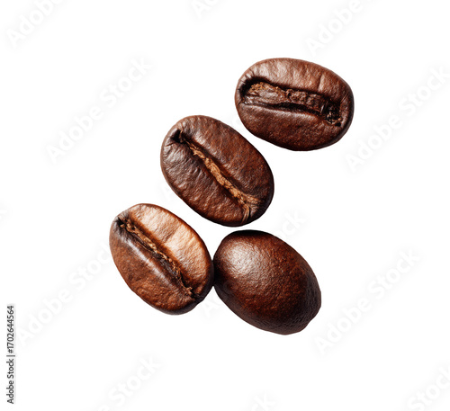 Close-up of four coffee beans, showcasing their rich brown color and distinct grooves