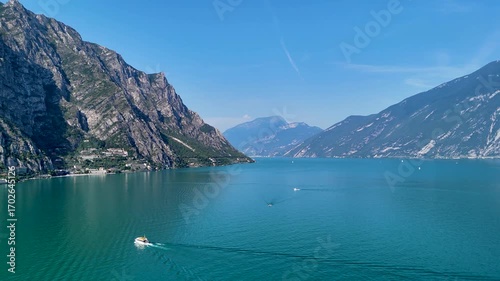 Garda lake panoramic view. Aerial 4K video footage of lake Garda and Italian Alps. Lombardy drone landscape