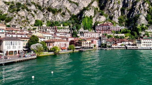 Limone sul Garda old town. Aerial 4K video footage of panoramic lake Garda and Italian Alps mountains. Lombardy drone landscape of downtown