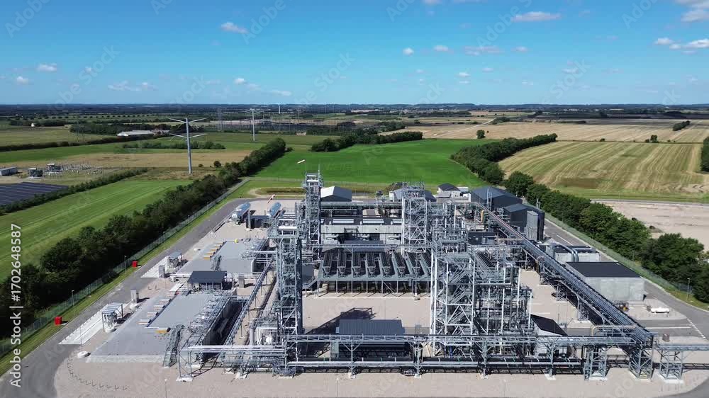 Aerial view of European Energy’s Power-to-X facility , e-methanol production facilityin , Denmark, surrounded by fields, solar panels and green energy infrastructure