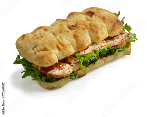 Fotografija Grilled chicken focaccia sandwich with lettuce and spicy glaze on white backgrou