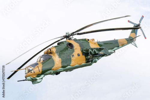 Принти на полотні Camouflaged Soviet Mi-24 military attack helicopter in low flight