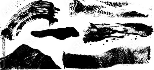Bold black ink grunge texture set featuring rough ink splatters and strokes for urban design