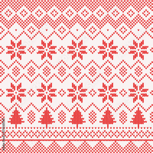 Knitted red Christmas background, ornament with snowflakes. Seamless pattern. Texture for fabric, wrapping, wallpaper. Decorative print.