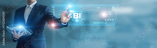 Photos Businessman working with digital device with business intelligence, data visuali
