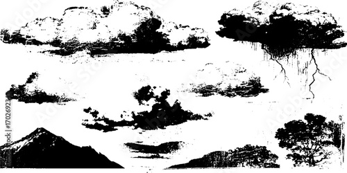 Dramatic black ink silhouettes of clouds and sky with trees and mountains
