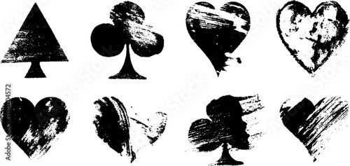 Grunge playing card suit silhouettes with black ink strokes for design projects