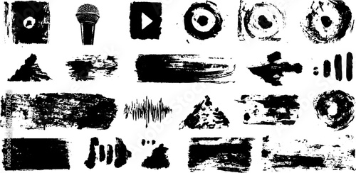 Grunge black ink symbol collection featuring microphone and audio icons for urban art design