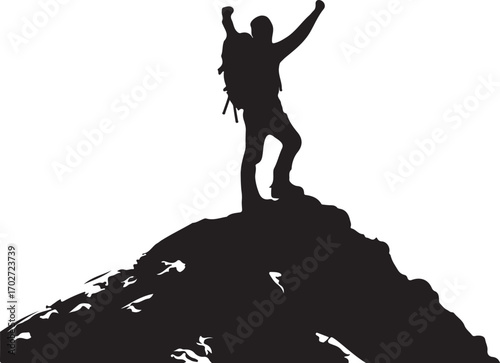 Silhouette of a hiker with arms raised in triumph on a rocky mountain peak summit