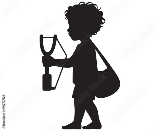 Black silhouette of little boy holding slingshot isolated on white background, simple childhood illustration symbolizing play, mischief, fun, adventure, innocence, youth, and traditional outdoor games
