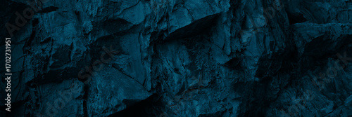 Fotografie Black dark blue turquoise stone rock texture background