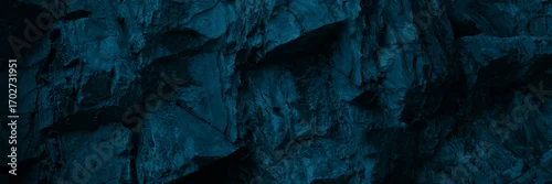 Panel kuchenny z motywem Black dark blue turquoise stone rock texture background. Toned rocky surface mountain. Close-up. Nature. For design. Wide banner. Panoramic.