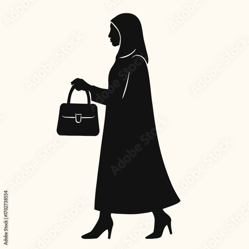Elegant Muslim Woman Silhouette Walking Confidently with Handbag, Symbolizing Modest Fashion and Contemporary Cultural Identity
