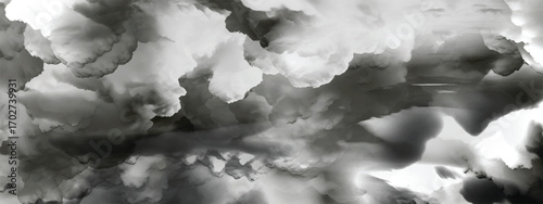 Dark billowing clouds filling the sky with intense natural texture and contrast