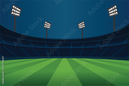 Night stadium with glowing floodlights and green field