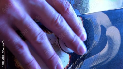 Hand pressing flipper button on pinball machine 4k