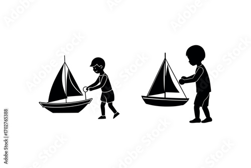 children playing with toy boats on beach silhouette