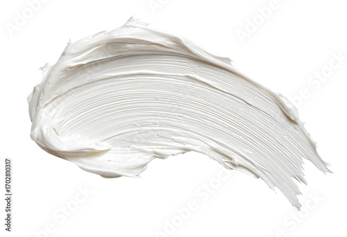 Creamy, white substance smudged and swirled, a smooth, textured smear