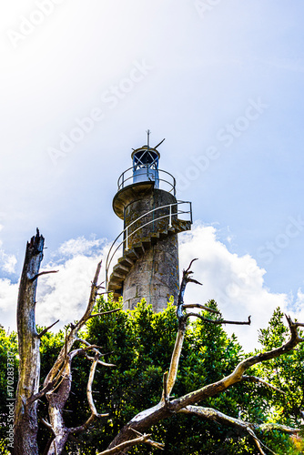 lighthouse on the top of a hill