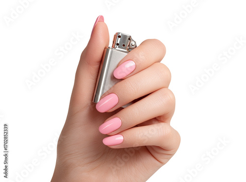A hand holding a lighter with pink nails