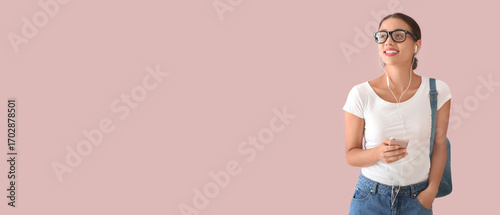 Beautiful young woman liste...