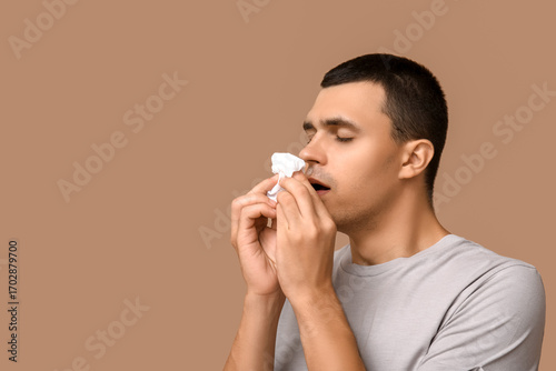 Ill young man with tissue b...