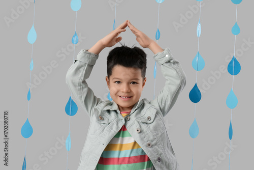 Cute little Asian boy with ...