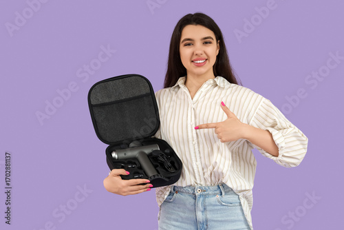 Young woman pointing at per...