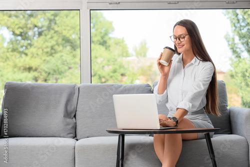 Young businesswoman working...