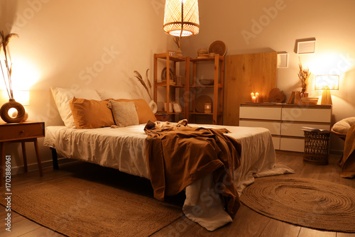 Interior of dark bedroom wi...