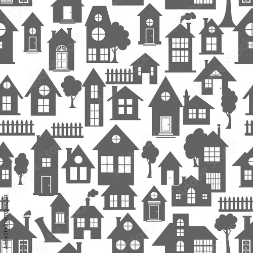 Seamless pattern with various house silhouettes and trees.