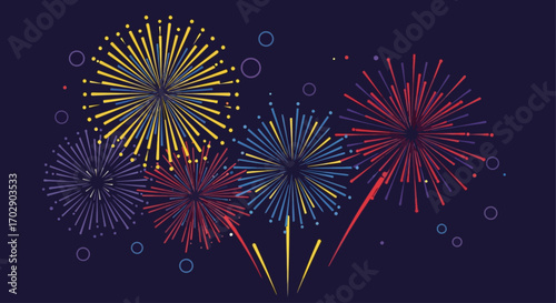 Colorful fireworks bursts against a dark night sky.