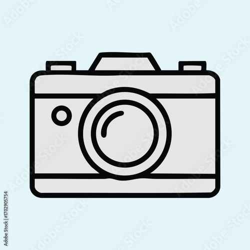 Minimalist flat design illustration of a classic camera with lens and buttons on a light blue background