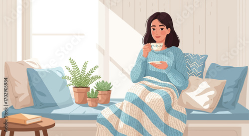 Cozy scene of a young woman enjoying tea by the window on a comfortable seat and pillows