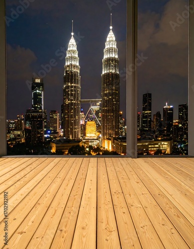 Empty room with wooden floor, city skyline view at night