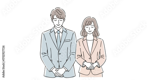 Professional man and woman in suits bowing respectfully, conveying gratitude and teamwork.