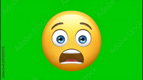 A face screaming in fear emoji on a perfectly even chroma-green background for clean keying