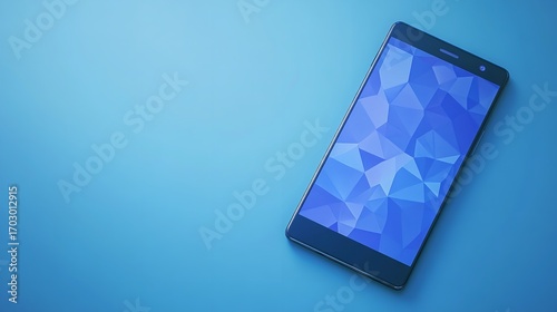 A sleek smartphone displaying a mesmerizing polygonal blue pattern symbolizing digital innovation and cool technology on