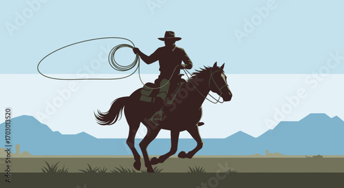 Silhouette of a cowboy on a galloping horse holding a lasso against a light blue sky and distant mountains