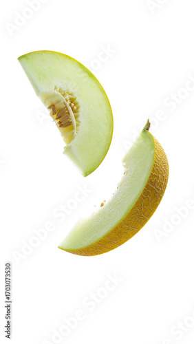 Two melon slices, pale yellow,  sliced,  falling,  isolated,  fresh