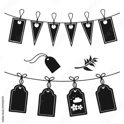 Set of black silhouette tags and pennant banners hanging on strings with bows and a decorative branch