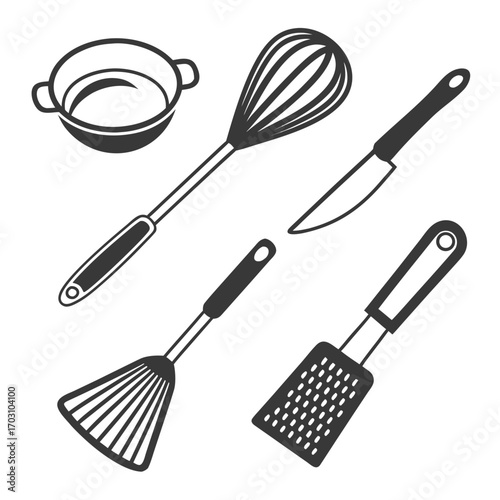 Collection of essential kitchen utensils including a whisk knife spatula grater and small pot for cooking and baking