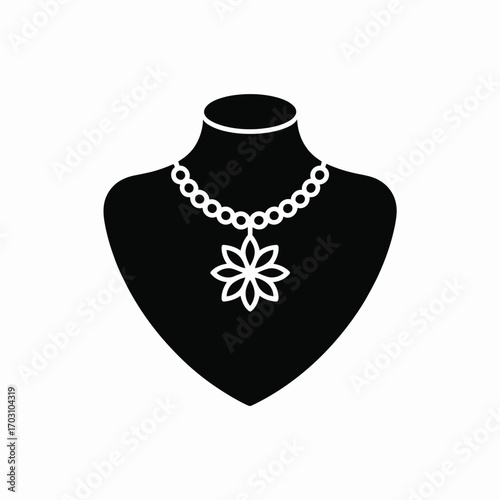 Black jewelry bust displaying white floral pendant necklace vector