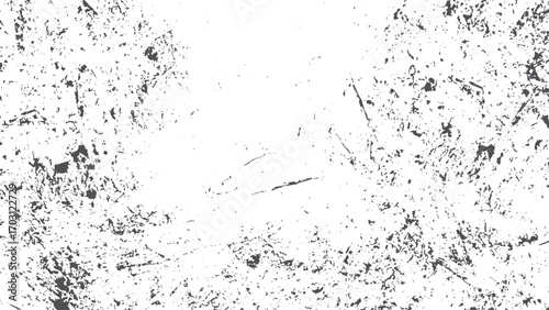 Distressed abstract grunge texture with scratches cracks dust scuffs and chips on vintage retro black and white surface pattern