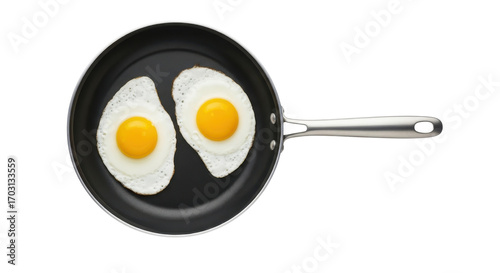 Two sunny-side up fried eggs in a black frying pan isolated PNG with Transparent Background