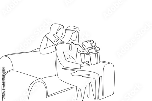 Single one line drawing an arab man sitting on the sofa while opening a gift box. Exchanging gifts fosters feelings of affection. Role model. Surprise. Continuous line design graphic illustration