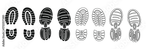 Collection of Black Footprints and Shoe Prints on White Background