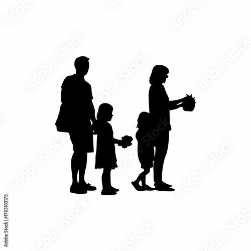 Parents teaching children to wash fruits for healthy eating