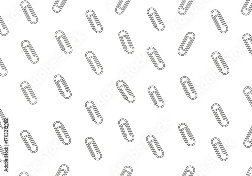 A seamless pattern of silver paperclips scattered across a white background, creating a simple and clean design.