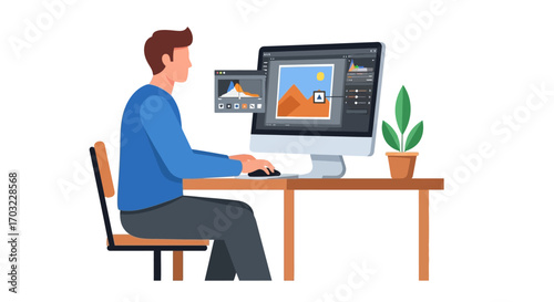 Man focused on photo editing software.